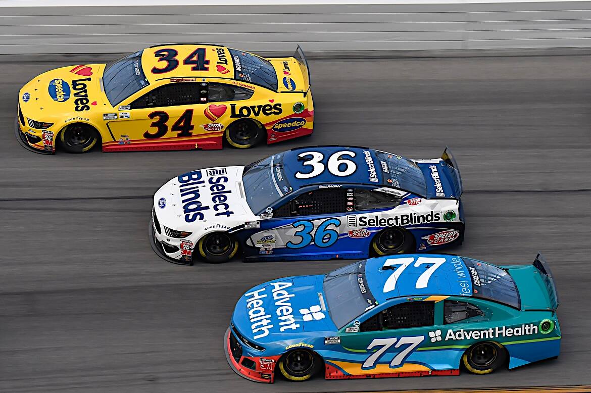 Front Row Motorsports' David Ragan (36) was fourth. Front Row Motorsports' David Ragan (36) was fourth.
